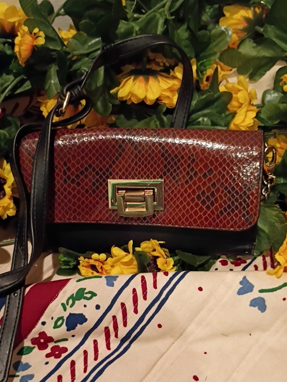 Snake-Embossed Brown Crossbody Bag with Black Trim